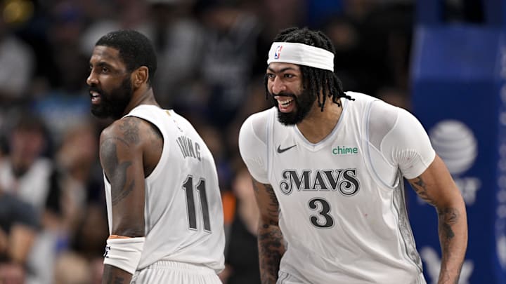 Feb 8, 2025; Dallas, Texas, USA; Dallas Mavericks forward Anthony Davis (3) and guard Kyrie Irving (11) celebrates after Davis dunks the ball during the game between the Dallas Mavericks and the Houston Rockets at the American Airlines Center. Mandatory Credit: Jerome Miron-Imagn Images