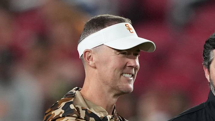 Sep 12, 2026; Los Angeles, California, USA; Southern California Trojans head coach Lincoln Riley (left) talks with Louisiana Ragin' Cajuns head coach Michael Desormeaux before the game at United Airlines Field at Los Angeles Memorial Coliseum Sep 12, 2026; Los Angeles, California, USA; Southern California Trojans head coach Lincoln Riley (left) talks with Louisiana Ragin' Cajuns head coach Michael Desormeaux before the game at United Airlines Field at Los Angeles Memorial Coliseum