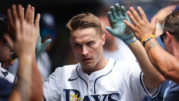 Tampa Bay Rays left fielder Jake Mangum (28) celebrates after hitting an inside the park home run against the Athletics.
