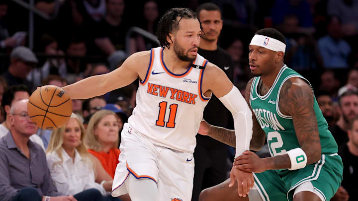 May 16, 2025; New York, New York, USA; New York Knicks guard Jalen Brunson (11) controls the ball against Boston Celtics forward Torrey Craig (12) during the fourth quarter of game six in the second round of the 2025 NBA Playoffs at Madison Square Garden. Mandatory Credit: Brad Penner-Imagn Images