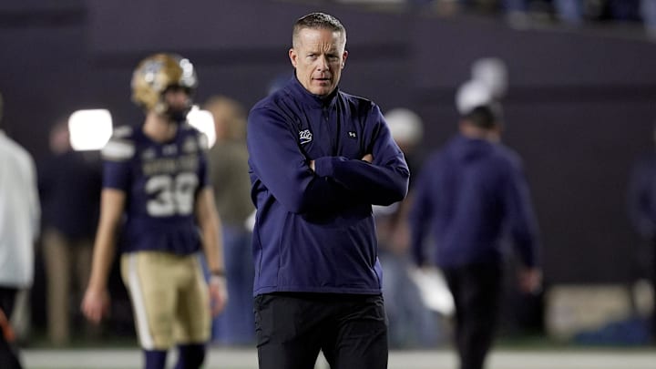 Montana State coach Brent Vigen watches his players warm up before playing Illinois State in the FCS National Championship game