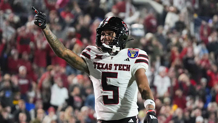 Texas Tech's Caleb Douglas (5) reacts after making a first down during the AutoZone Liberty Bowl between Arkansas and Texas Tech in Memphis, Tenn., on Friday, December 27, 2024.
