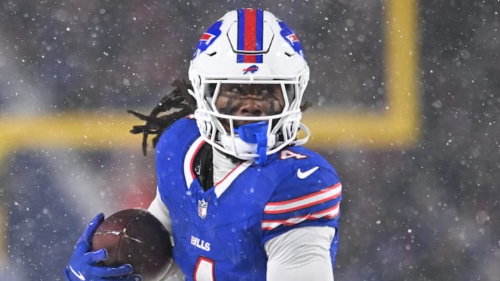 Dec 1, 2024; Orchard Park, New York, USA; Buffalo Bills running back James Cook (4) runs for a first down against the San Francisco 49ers in the second quarter at Highmark Stadium. Mandatory Credit: Mark Konezny-Imagn Images Dec 1, 2024; Orchard Park, New York, USA; Buffalo Bills running back James Cook (4) runs for a first down against the San Francisco 49ers in the second quarter at Highmark Stadium. Mandatory Credit: Mark Konezny-Imagn Images
