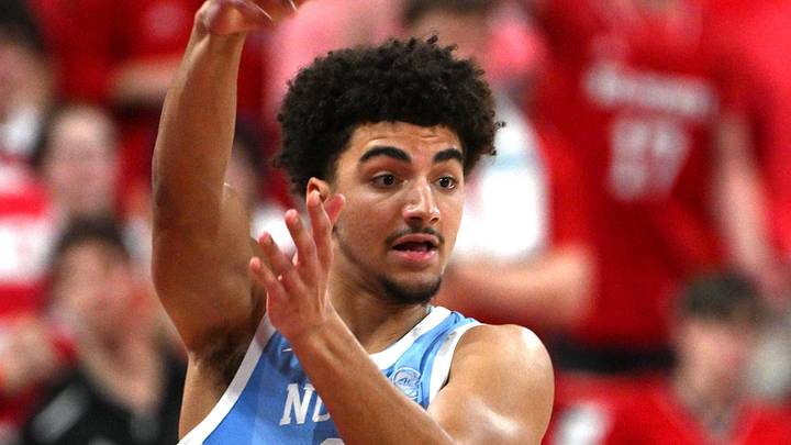 Feb 17, 2026; Raleigh, North Carolina, USA; North Carolina Tar Heels guard Derek Dixon (3) passes the ball at the half court against during the first half against the NC State Wolfpack Lenovo Center. Mandatory Credit: Zachary Taft-Imagn Images Feb 17, 2026; Raleigh, North Carolina, USA; North Carolina Tar Heels guard Derek Dixon (3) passes the ball at the half court against during the first half against the NC State Wolfpack Lenovo Center. Mandatory Credit: Zachary Taft-Imagn Images