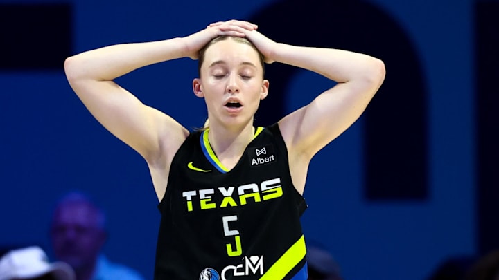 Aug 24, 2025; Arlington, Texas, USA;  Dallas Wings guard Paige Bueckers (5) reacts during the second half against the Golden State Valkyries at College Park Center. Mandatory Credit: Kevin Jairaj-Imagn Images