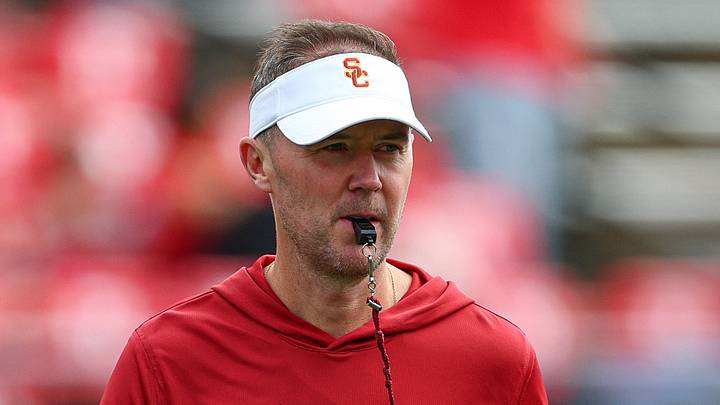 Sep 19, 2026; Piscataway, New Jersey, USA; USC Trojans head coach Lincoln Riley on the field during warm ups before the game against the Rutgers Scarlet Knights at SHI Stadium. Mandatory Credit: Vincent Carchietta-Imagn Images Sep 19, 2026; Piscataway, New Jersey, USA; USC Trojans head coach Lincoln Riley on the field during warm ups before the game against the Rutgers Scarlet Knights at SHI Stadium. Mandatory Credit: Vincent Carchietta-Imagn Images