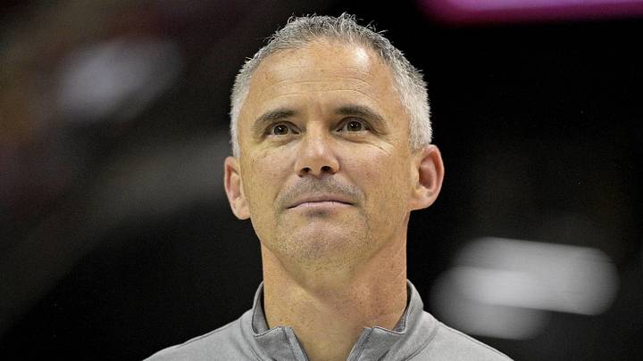 Mar 9, 2024; Tallahassee, Florida, USA; Florida State Seminoles head football coach Mike Norvell accepts the Bear Bryant coach of the Year award during a media timeout of a basketball game against the Miami Hurricanes at Donald L. Tucker Center. Mandatory Credit: Melina Myers-Imagn Images