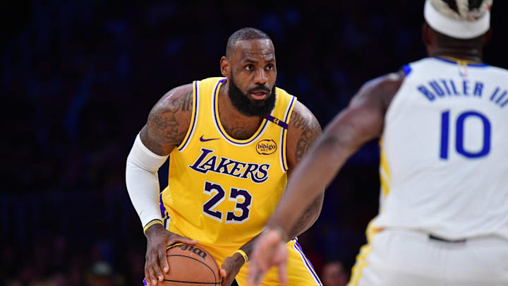 Los Angeles Lakers forward LeBron James (23) controls the ball against the Golden State Warriors during the first half at Crypto.com Arena.