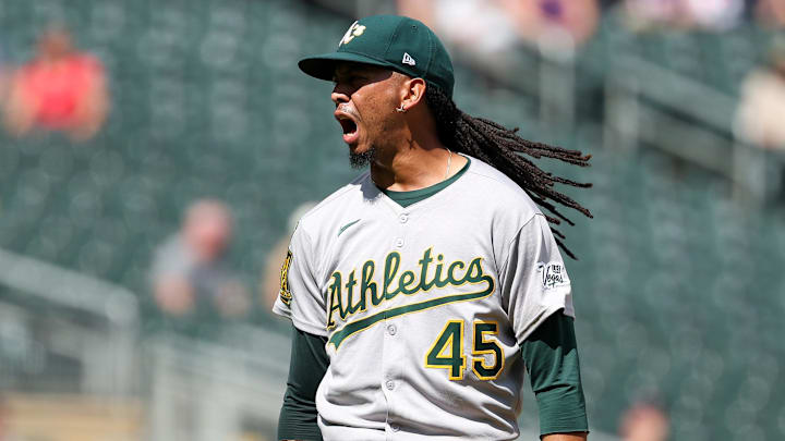 Athletics relief pitcher Osvaldo Bido (45) celebrates 