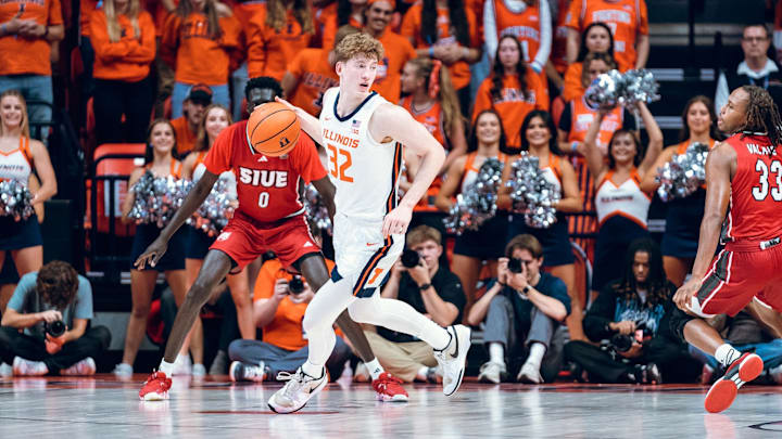 Illinois guard Kasparas Jakucionis (32) searches for an opening against SIU-Edwardsville in the Illini's 90-58 win Friday at the State Farm Center in Champaign.