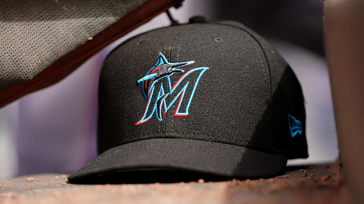 Apr 11, 2019; Cincinnati, OH, USA; A view of a New Era Miami Marlins hat in the dugout during the game against the Cincinnati Reds at Great American Ball Park. Apr 11, 2019; Cincinnati, OH, USA; A view of a New Era Miami Marlins hat in the dugout during the game against the Cincinnati Reds at Great American Ball Park.