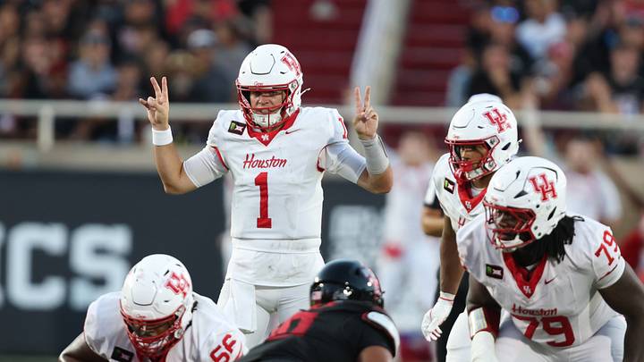 Sep 18, 2026; Lubbock, Texas, USA;  Houston Cougars quarterback Conner Weigman (1) signals against the Texas Tech Red Raiders defense in the first half at Galaxy Stadium.  Mandatory Credit: Michael C. Johnson-Imagn Images