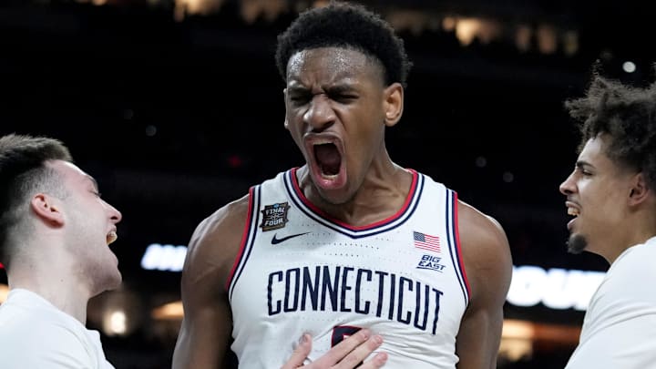 UConn Huskies forward Tarris Reed Jr. (5) celebrates the team’s Final Four victory Saturday, April 4, 2026, after defeating the Illinois Fighting Illini 71-62 at Lucas Oil Stadium in Indianapolis.