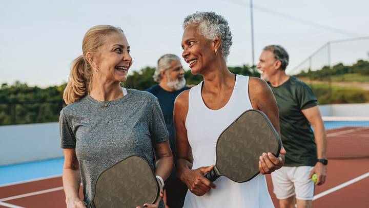 Group of people playing pickleball