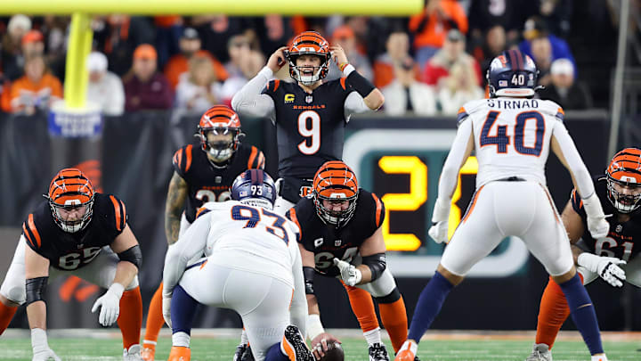 Dec 28, 2024; Cincinnati, Ohio, USA;  Cincinnati Bengals quarterback Joe Burrow (9) audibles during the second quarter against the Denver Broncos at Paycor Stadium. Mandatory Credit: Joseph Maiorana-Imagn Images