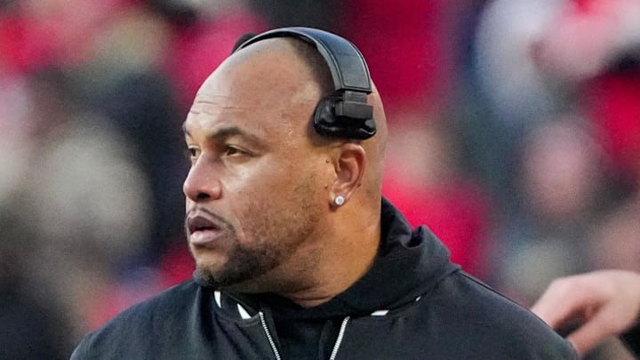 Nov 29, 2024; Kansas City, Missouri, USA; Las Vegas Raiders head coach Antonio Pierce watches play against the Kansas City Chiefs during the second half at GEHA Field at Arrowhead Stadium. Mandatory Credit: Denny Medley-Imagn Images