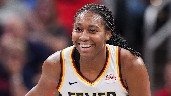 Indiana Fever forward Aliyah Boston (7) smiles after scoring Friday, July 12, 2024, during the game at Gainbridge Fieldhouse in Indianapolis. The Indiana Fever defeated the Phoenix Mercury, 95-86.