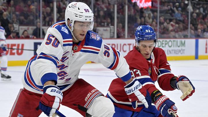 Oct 18, 2025; Montreal, Quebec, CAN; New York Rangers forward Will Cuylle (50) and Montreal Canadiens forward Ivan Demidov (93) battle for the puck during the first period at the Bell Centre. Oct 18, 2025; Montreal, Quebec, CAN; New York Rangers forward Will Cuylle (50) and Montreal Canadiens forward Ivan Demidov (93) battle for the puck during the first period at the Bell Centre.