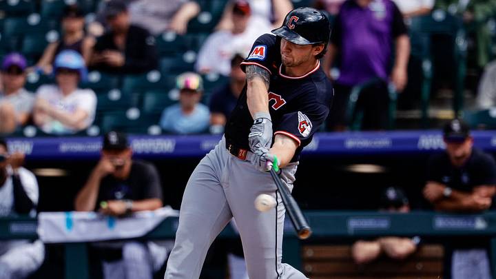 Aug 23, 2026; Denver, Colorado, USA; Cleveland Guardians designated hitter Chase DeLauter (24) hits a triple in the fourth inning against the Colorado Rockies at Coors Field. Mandatory Credit: Isaiah J. Downing-Imagn Images