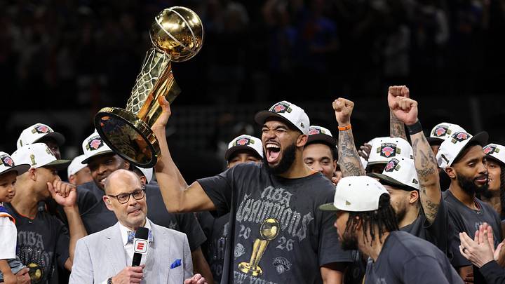 Jun 13, 2026; San Antonio, Texas, USA; New York Knicks center Karl-Anthony Towns (R) celebrates with the Larry O'Brien championship trophy while being interviewed by broadcaster Ernie Johnson (L) after game five of the 2026 NBA Finals against the San Antonio Spurs at Frost Bank Center. Mandatory Credit: Geoff Burke-Imagn Images Jun 13, 2026; San Antonio, Texas, USA; New York Knicks center Karl-Anthony Towns (R) celebrates with the Larry O'Brien championship trophy while being interviewed by broadcaster Ernie Johnson (L) after game five of the 2026 NBA Finals against the San Antonio Spurs at Frost Bank Center. Mandatory Credit: Geoff Burke-Imagn Images