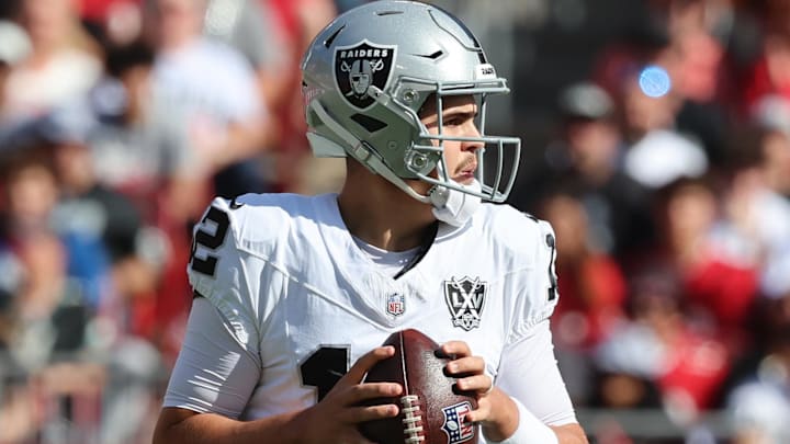Dec 8, 2024; Tampa, Florida, USA; Las Vegas Raiders quarterback Aidan O'Connell (12) drops back during the first half against the Tampa Bay Buccaneers at Raymond James Stadium. Mandatory Credit: Kim Klement Neitzel-Imagn Images Dec 8, 2024; Tampa, Florida, USA; Las Vegas Raiders quarterback Aidan O'Connell (12) drops back during the first half against the Tampa Bay Buccaneers at Raymond James Stadium. Mandatory Credit: Kim Klement Neitzel-Imagn Images
