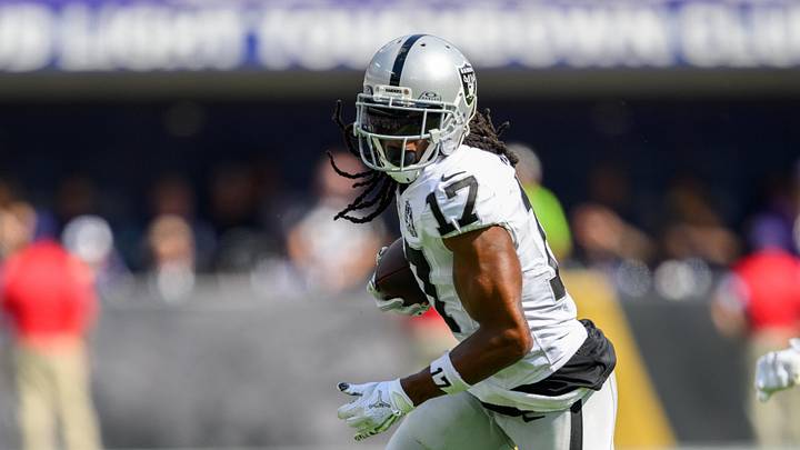 Sep 15, 2024; Baltimore, Maryland, USA; Las Vegas Raiders wide receiver Davante Adams (17) runs with the ball as Baltimore Ravens cornerback Marlon Humphrey (44) defends during the second half at M&T Bank Stadium. Mandatory Credit: Reggie Hildred-Imagn Images