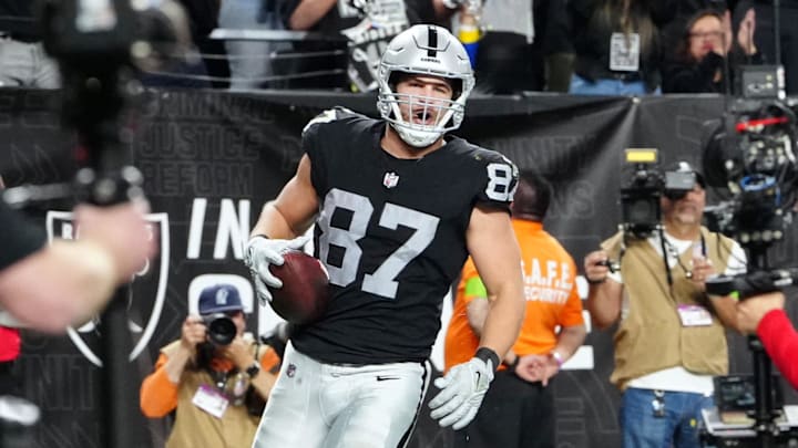Dec 14, 2023; Paradise, Nevada, USA; Las Vegas Raiders tight end Michael Mayer (87) celebrates after scoring a touchdown in the second quarter against the Los Angeles Chargers at Allegiant Stadium. Mandatory Credit: Stephen R. Sylvanie-Imagn Images