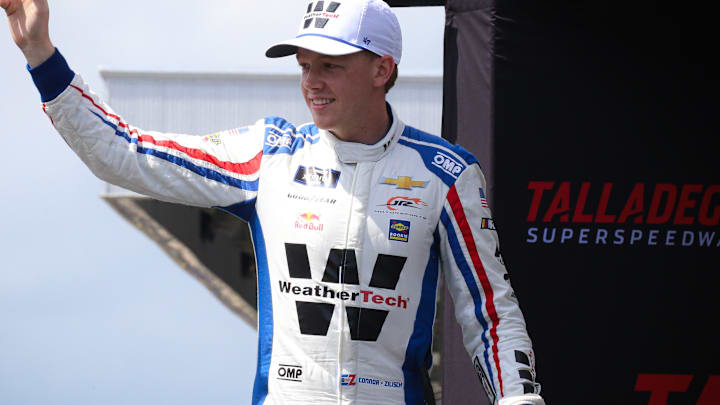 Connor Zilisch waves to fans during driver introductions prior to Saturday's NASCAR Xfinity Series Ag-Pro 300 at Talladega Superspeedway. Connor Zilisch waves to fans during driver introductions prior to Saturday's NASCAR Xfinity Series Ag-Pro 300 at Talladega Superspeedway.