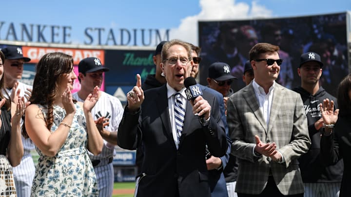 Apr 20, 2024; Bronx, New York, USA; Longtime Yankee announcer John Sterling is honored during a pregame ceremony in recognition of his retirement before a game against the Toronto Blue Jays at Yankee Stadium. Mandatory Credit: John Jones-Imagn Images