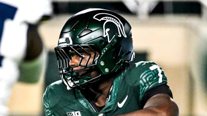 Michigan State's Brandon Tullis runs the ball against Michigan during the third quarter on Saturday, Oct. 25, 2025, at Spartan Stadium in East Lansing.