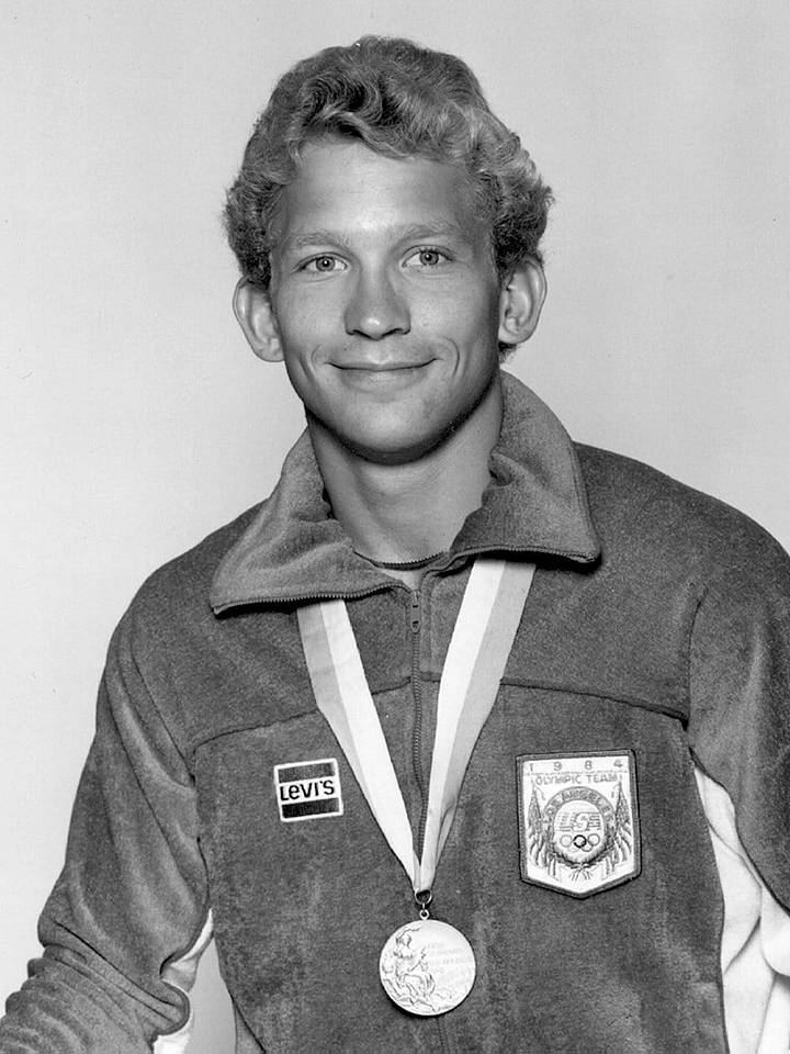 Jim Hartung poses with U.S. team Olympic gold medal Jim Hartung poses with U.S. team Olympic gold medal