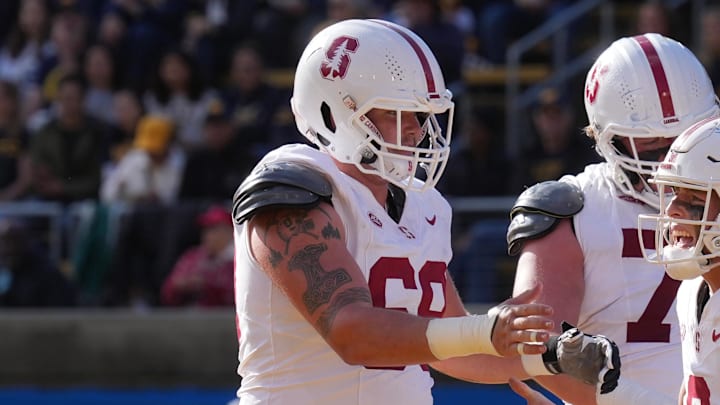 Nov 23, 2024; Berkeley, California, USA; Stanford Cardinal quarterback Justin Lamson (8) celebrates with Stanford Cardinal offensive lineman Jake Maikkula (left) after scoring a touchdown against the California Golden Bears during the first quarter at California Memorial Stadium. Mandatory Credit: Darren Yamashita-Imagn Images Nov 23, 2024; Berkeley, California, USA; Stanford Cardinal quarterback Justin Lamson (8) celebrates with Stanford Cardinal offensive lineman Jake Maikkula (left) after scoring a touchdown against the California Golden Bears during the first quarter at California Memorial Stadium. Mandatory Credit: Darren Yamashita-Imagn Images
