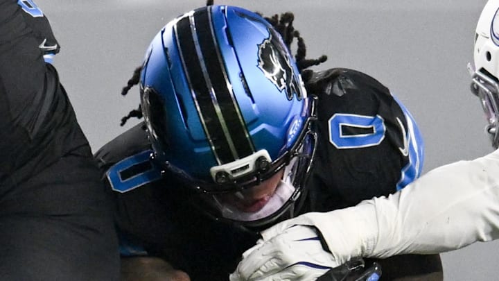 Detroit Lions running back Jahmyr Gibbs (0).