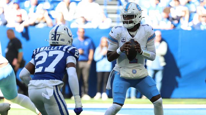 Oct 18, 2026; Indianapolis, Indiana, USA;  Tennessee Titans quarterback Cam Ward (1) looks to pass during the first half against the Indianapolis Colts at Lucas Oil Stadium.  Mandatory Credit: Trevor Ruszkowski-Imagn Images