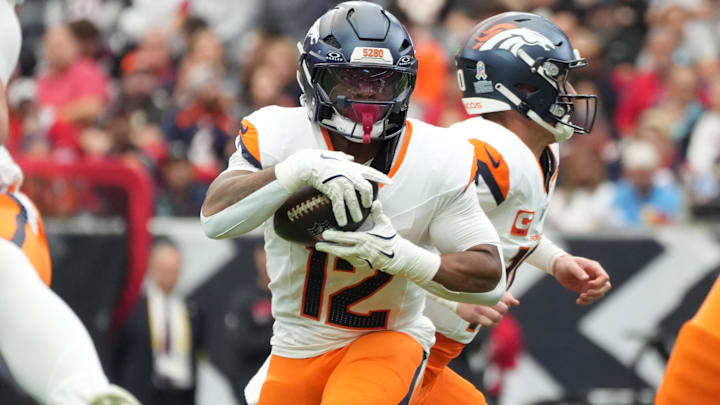 Nov 2, 2025; Houston, Texas, USA; Denver Broncos running back RJ Harvey (12) runs during the first half against the Houston Texans at NRG Stadium. Nov 2, 2025; Houston, Texas, USA; Denver Broncos running back RJ Harvey (12) runs during the first half against the Houston Texans at NRG Stadium.