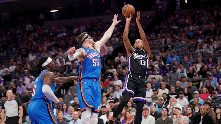 Mar 25, 2025; Sacramento, California, USA; Sacramento Kings forward Keegan Murray (13) shoots over Oklahoma City Thunder center Isaiah Hartenstein (55) in the first quarter at the Golden 1 Center. Mandatory Credit: Cary Edmondson-Imagn Images Mar 25, 2025; Sacramento, California, USA; Sacramento Kings forward Keegan Murray (13) shoots over Oklahoma City Thunder center Isaiah Hartenstein (55) in the first quarter at the Golden 1 Center. Mandatory Credit: Cary Edmondson-Imagn Images
