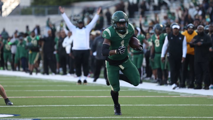 Deondrae Riden barrels toward the endzone in a 6A Division II Texas state semifinal win over Southlake Carroll in November 2023.