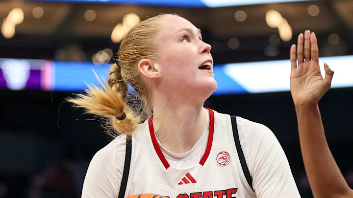 Nov 9, 2025; Charlotte, North Carolina, USA; NC State Wolfpack forward Tilda Trygger (18) looks to the basket against the Southern California Trojans during the second quarter of the Ally Tipoff game at Spectrum Center. Mandatory Credit: Cory Knowlton-Imagn Images