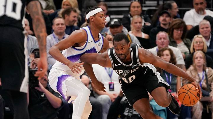Oct 12, 2026; Salt Lake City, Utah, USA; San Antonio Spurs forward Harrison Barnes (40) drives against Utah Jazz guard Ace Bailey (19) during the second half at Delta Center. Oct 12, 2026; Salt Lake City, Utah, USA; San Antonio Spurs forward Harrison Barnes (40) drives against Utah Jazz guard Ace Bailey (19) during the second half at Delta Center.