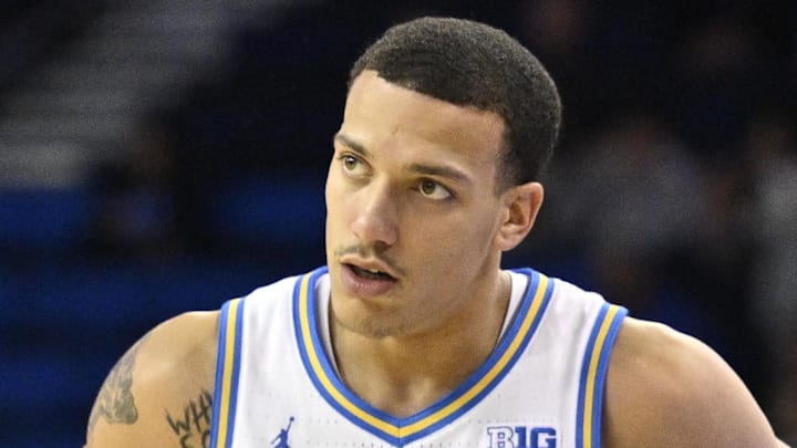 Nov 22, 2024; Los Angeles, California, USA; UCLA Bruins head coach Mick Cronin talks to UCLA Bruins guard Kobe Johnson (0) during the second half against the Cal State Fullerton Titans at Pauley Pavilion presented by Wescom. Mandatory Credit: Robert Hanashiro-Imagn Images