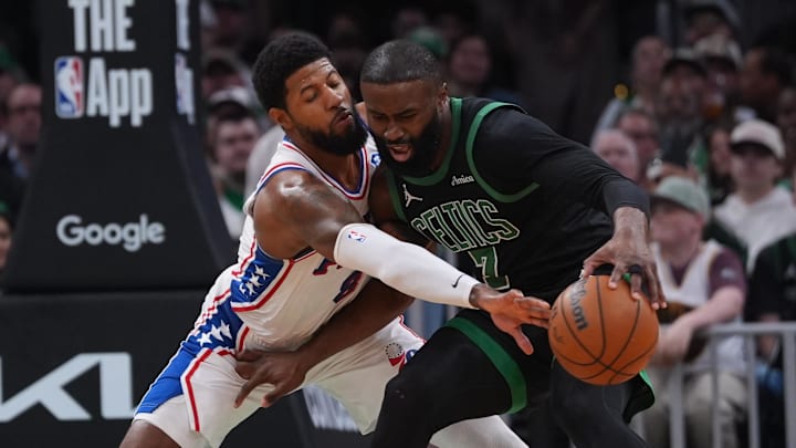 Apr 28, 2026; Boston, Massachusetts, USA; Philadelphia 76ers forward Paul George (8) defends against Boston Celtics guard Jaylen Brown (7) in the second quarter during game five of the first round of the 2026 NBA Playoffs at TD Garden. Mandatory Credit: David Butler II-Imagn Images