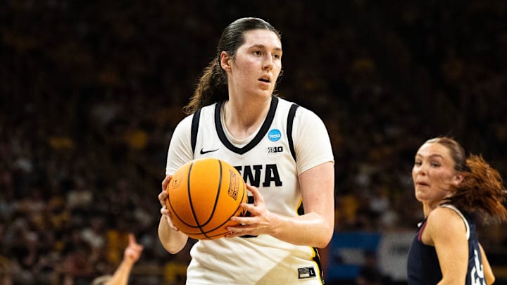 Iowa center Ava Heiden (5) grabs the basketball March 21, 2026 during a First Round NCAA March Madness game against the Fairleigh Dickinson Knights at Carver-Hawkeye Arena in Iowa City, Iowa.