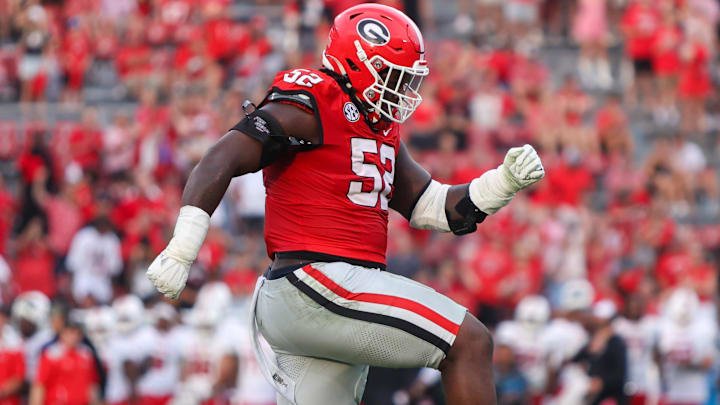 Sep 6, 2025; Athens, Georgia, USA; Georgia Bulldogs defensive lineman Christen Miller (52) reacts after a defensive stop against the Austin Peay Governors in the fourth quarter at Sanford Stadium. 