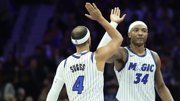 Nov 25, 2025; Philadelphia, Pennsylvania, USA; Orlando Magic guard Anthony Black (0) and center Wendell Carter Jr. (34) and guard Jalen Suggs (4) high five after a play against the Philadelphia 76ers during the second quarter at Xfinity Mobile Arena. Mandatory Credit: Bill Streicher-Imagn Images