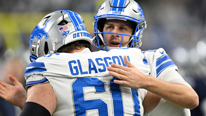 Detroit Lions quarterback Jared Goff (16) greets center Graham Glasgow (60) during warm ups Detroit Lions quarterback Jared Goff (16) greets center Graham Glasgow (60) during warm ups