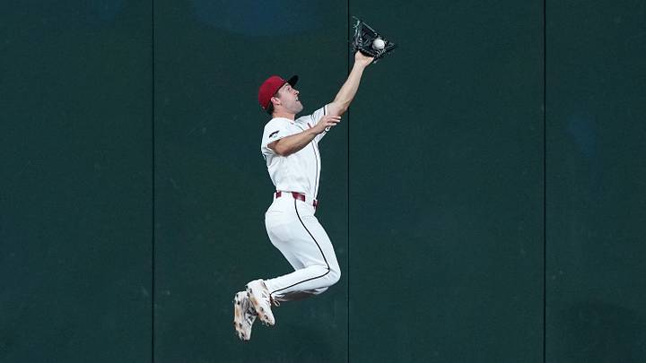 Aug 6, 2026; Phoenix, Arizona, USA; Arizona Diamondbacks center fielder Ryan Waldschmidt (15) leaps and makes a catch against the San Diego Padres during the third inning at Chase Field. Mandatory Credit: Joe Camporeale-Imagn Images