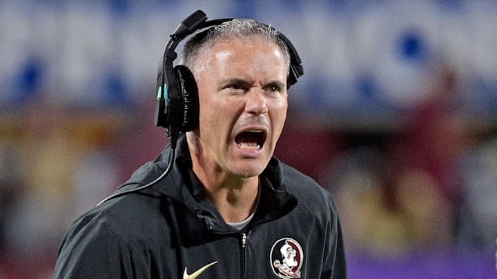 Sep 3, 2023; Orlando, Florida, USA; Florida State Seminoles head coach Mike Norvell is excited during the fourth quarter against the Louisiana State Tigers at Camping World Stadium. Mandatory Credit: Melina Myers-Imagn Images