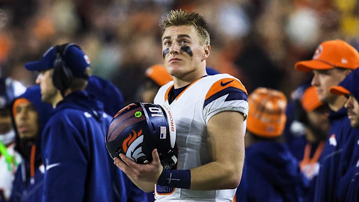 Dec 28, 2024; Cincinnati, Ohio, USA; Denver Broncos quarterback Bo Nix (10) stands on the sidelines during the second half against the Cincinnati Bengals at Paycor Stadium. Mandatory Credit: Katie Stratman-Imagn Images