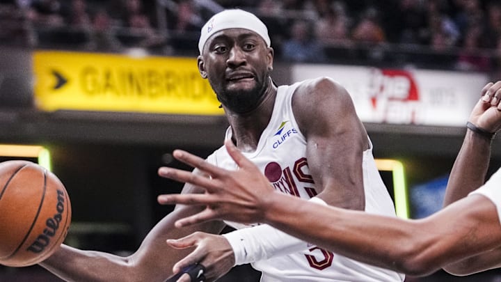 Jan 14, 2025; Indianapolis, IN, USA; Cleveland Cavaliers guard Caris LeVert (3) passes the ball over Indiana Pacers center Myles Turner (33) on Tuesday, Jan. 14, 2025, during an NBA game between the Indiana Pacers and the Cleveland Cavaliers at Gainbridge Fieldhouse in Indianapolis. The Cavaliers defeated the Pacers, 127-117. Mandatory Credit: Grace Smith/USA TODAY Network via Imagn Images 