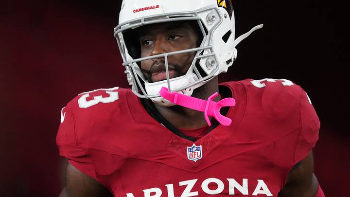 Arizona Cardinals running back Trey Benson (33) takes the field before their game against the Las Vegas Raiders at State Farm Stadium in Glendale, on Aug. 23, 2025. Arizona Cardinals running back Trey Benson (33) takes the field before their game against the Las Vegas Raiders at State Farm Stadium in Glendale, on Aug. 23, 2025.